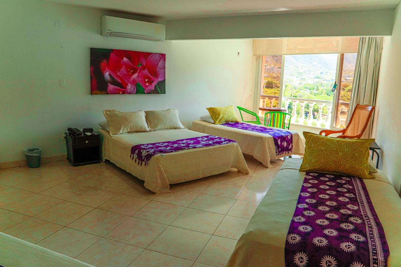 Hotel Bahia Таганга Экстерьер фото