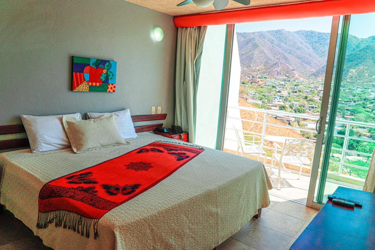 Hotel Bahia Таганга Экстерьер фото