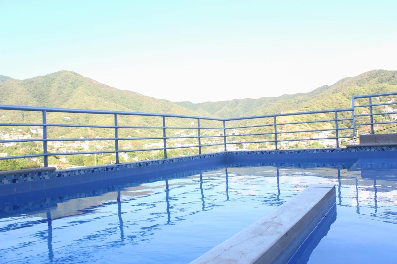 Hotel Bahia Таганга Экстерьер фото