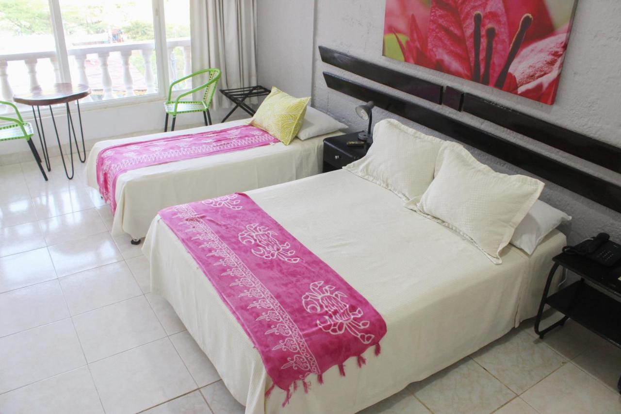 Hotel Bahia Таганга Экстерьер фото