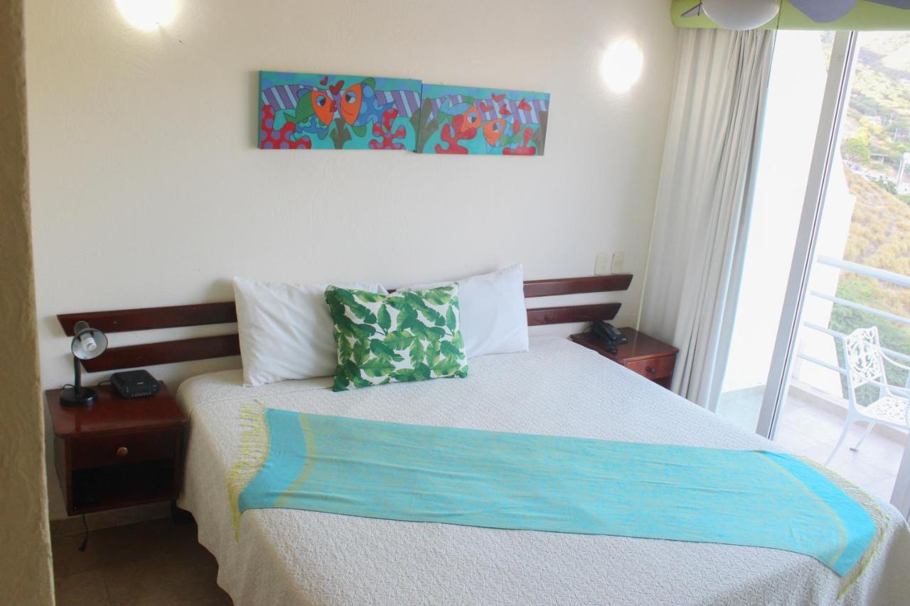 Hotel Bahia Таганга Экстерьер фото