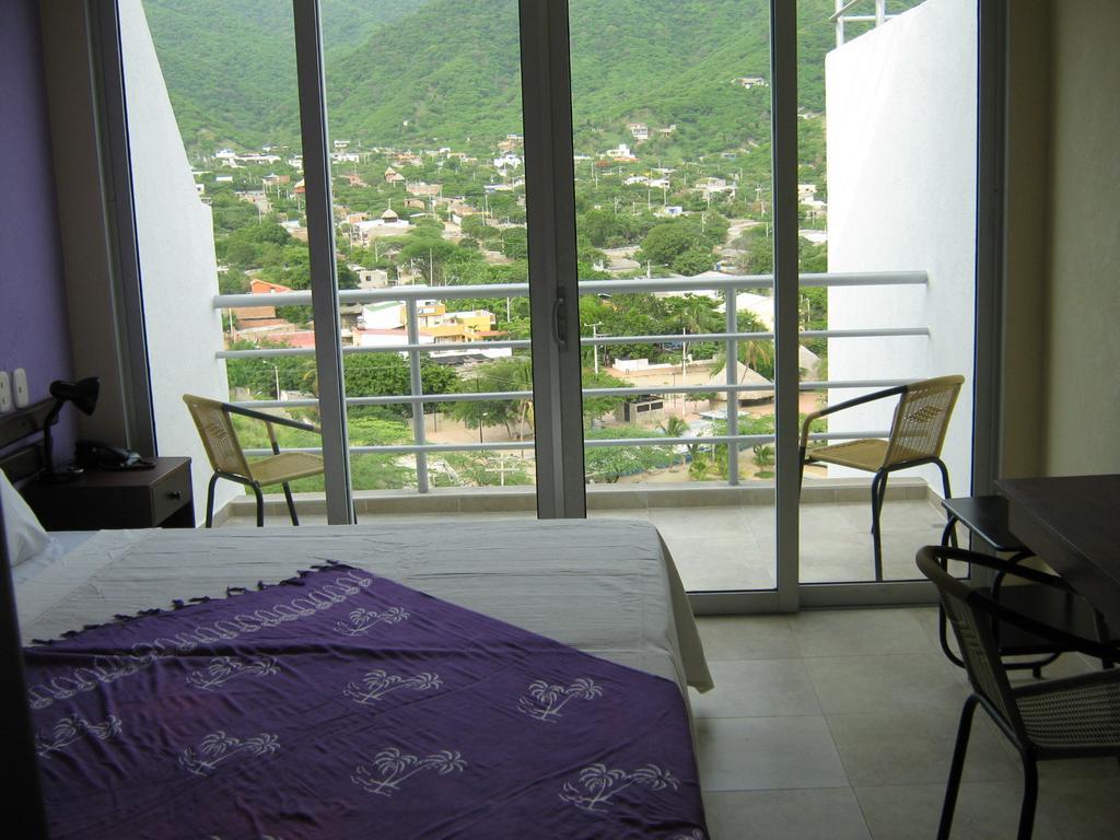 Hotel Bahia Таганга Экстерьер фото